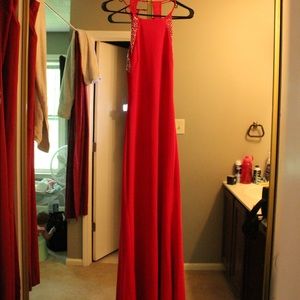 Red with silver beading ball gown